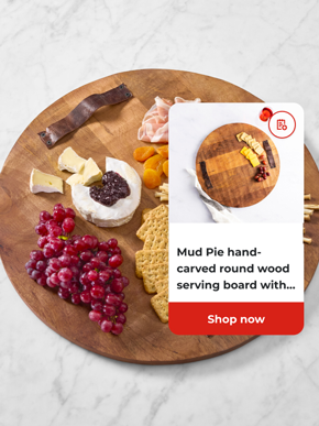 Mud Pie hand=carved round wood serving board with... Shop now